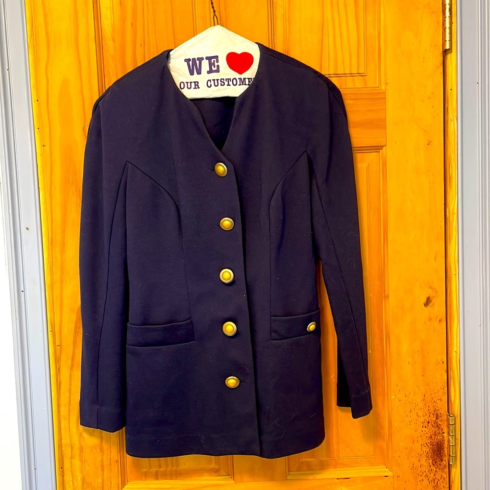 Blue suit like top.